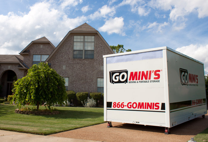 go minis storage container in front of house